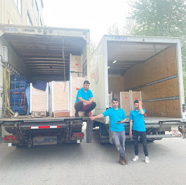 Local movers Vancouver BC loading household furniture into moving truck